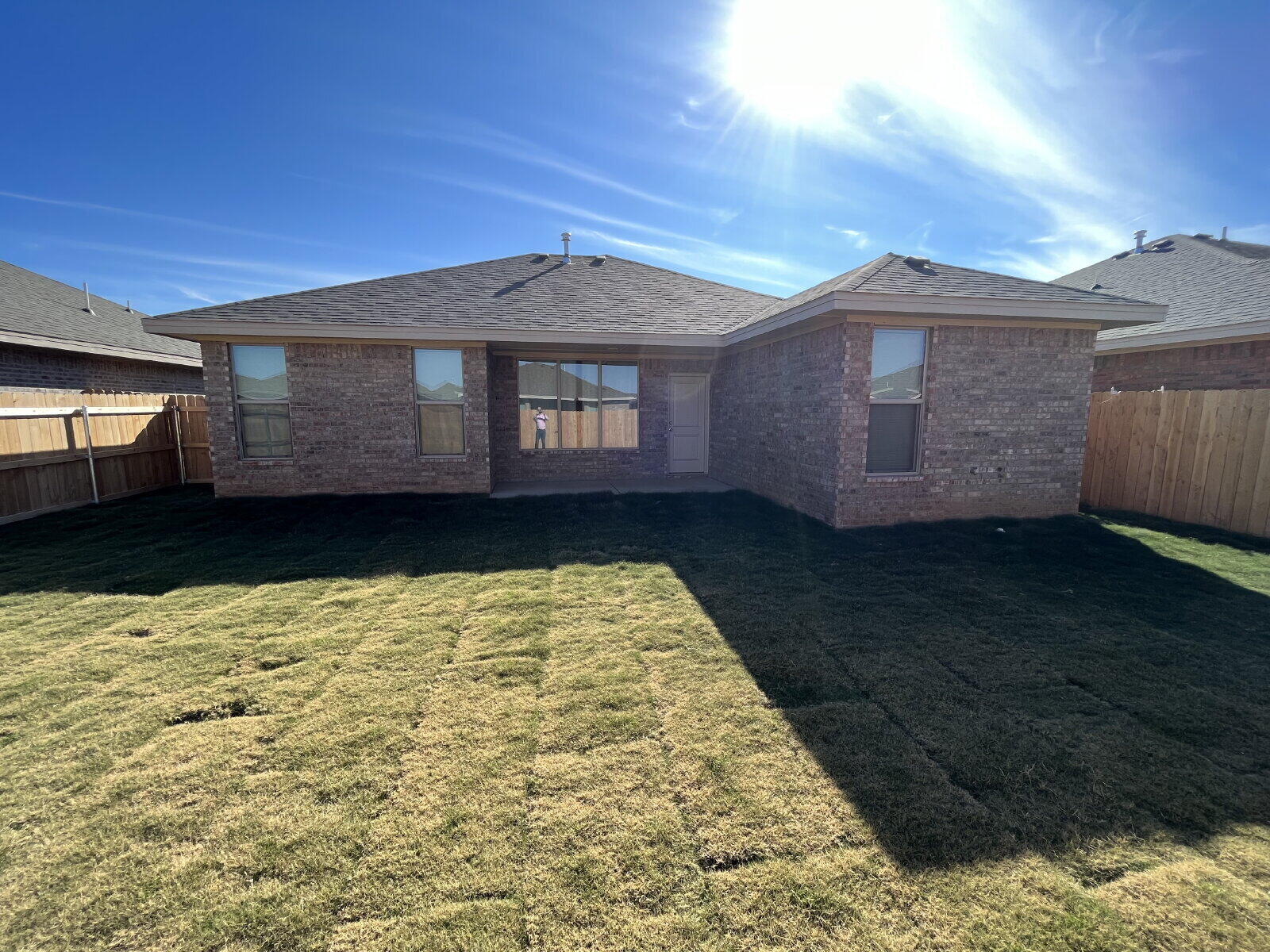 7010 12th Street Lubbock, TX 79416 - Photo 13 of 13 a view of a house with a yard