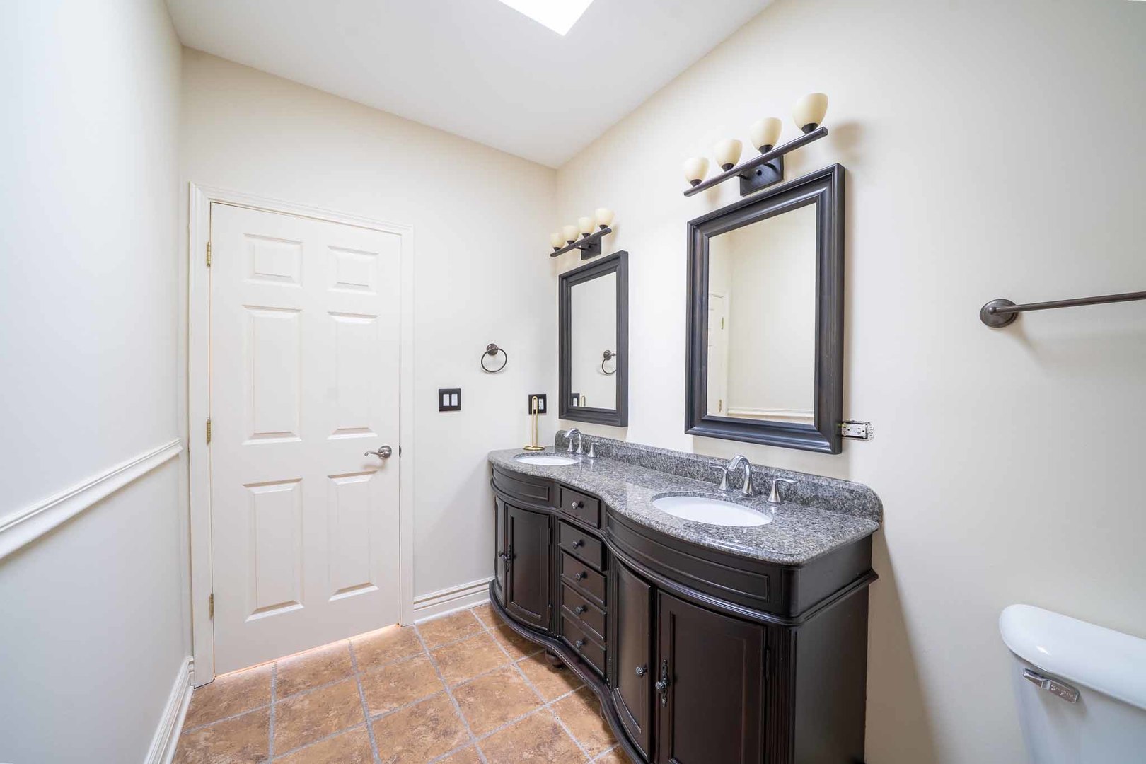 3123 West Washington Boulevard, Unit 3 Chicago, IL 60612 - Photo 20 of 24 a bathroom with a sink a vanity and a mirror