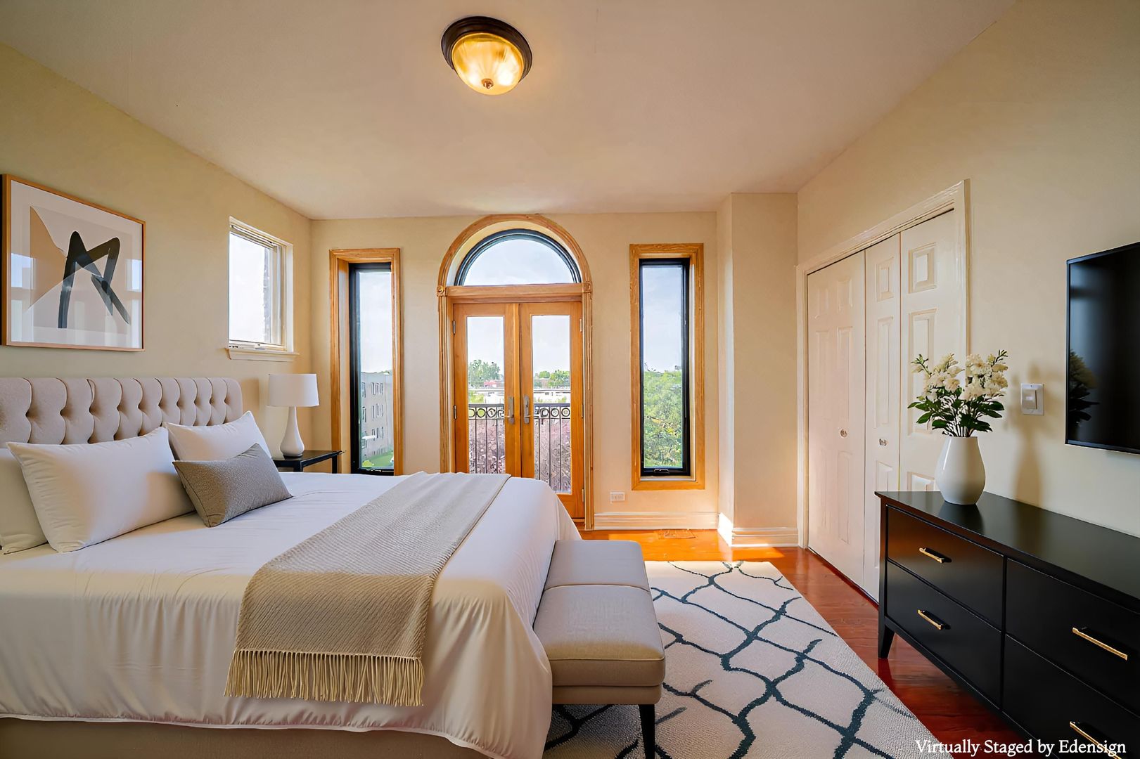 3123 West Washington Boulevard, Unit 3 Chicago, IL 60612 - Photo 21 of 24 a bedroom with a bed and a flat screen tv