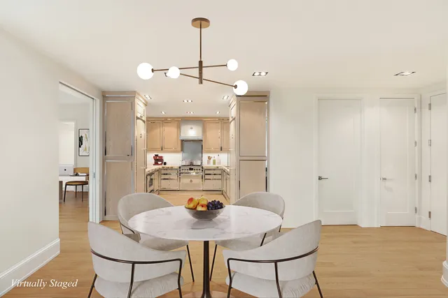 a kitchen with a stove top oven sink and cabinets