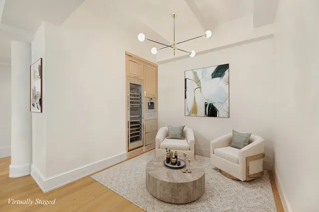 a bathroom with a double vanity sink a mirror and a bathtub