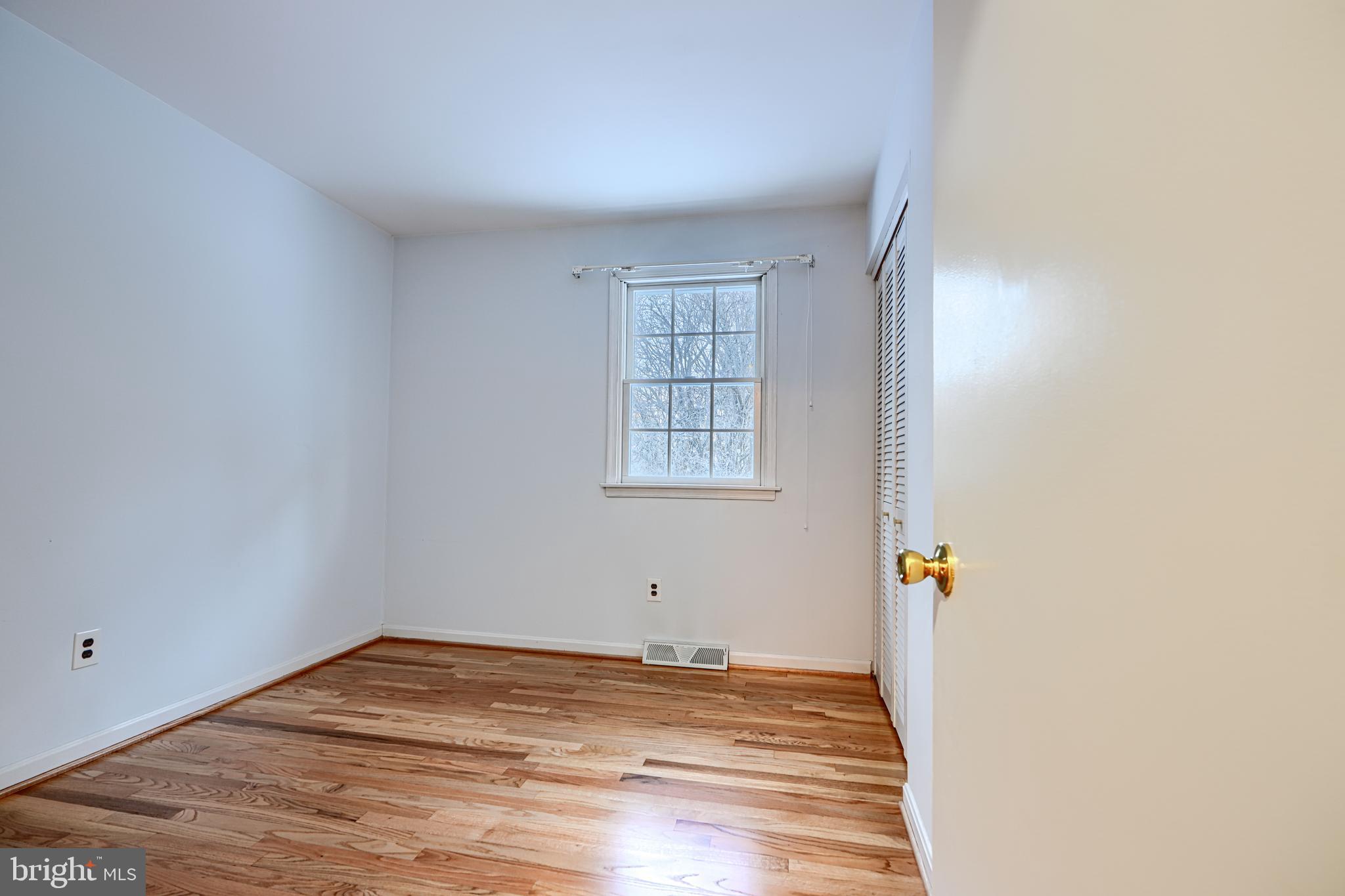 3528 Stansbury Mill Road Phoenix, MD 21131 - Photo 15 of 48 a view of empty room with wooden floor
