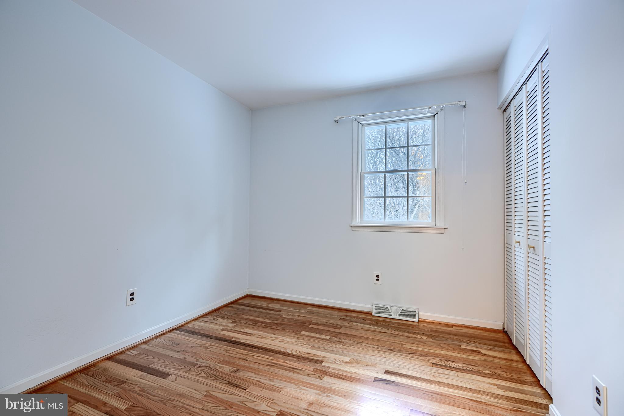 3528 Stansbury Mill Road Phoenix, MD 21131 - Photo 16 of 48 a view of empty room with wooden floor