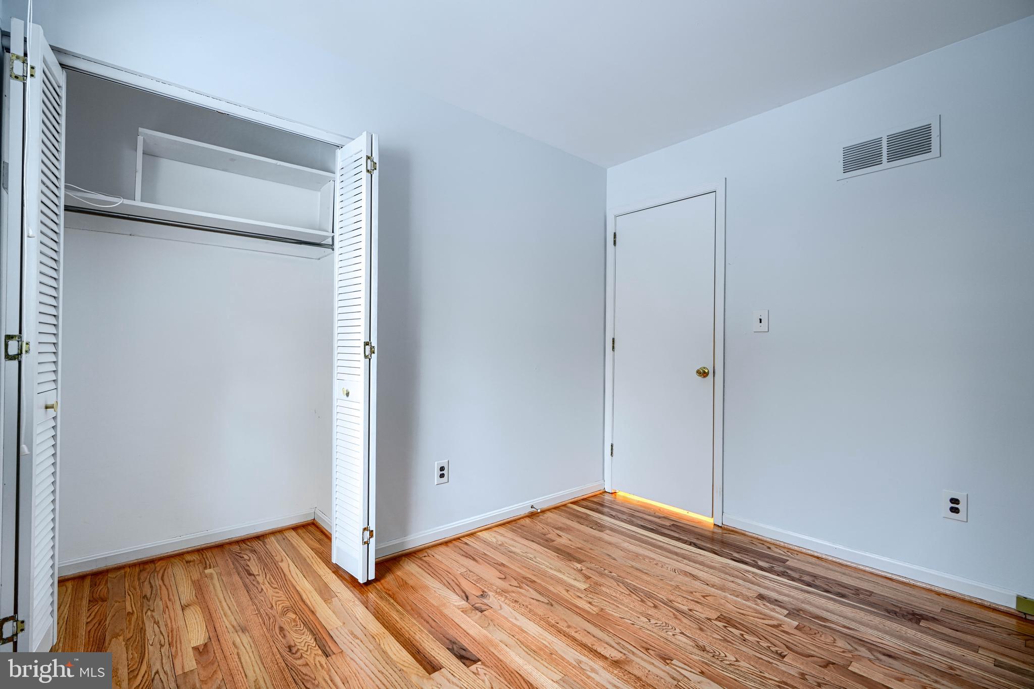 3528 Stansbury Mill Road Phoenix, MD 21131 - Photo 18 of 48 a view of room with wooden floor