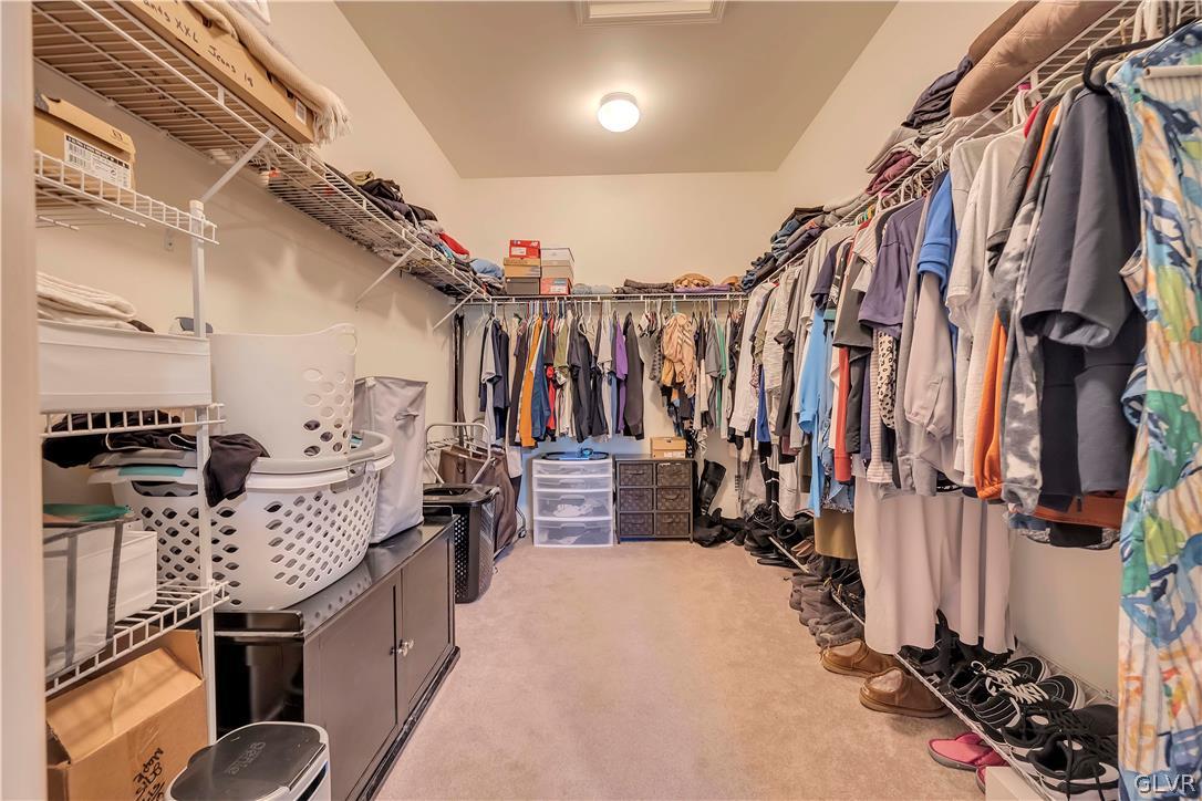 2715 Maple Drive Hellertown, PA 18055 - Photo 11 of 47 a view of walk in closet with clothes and shoes