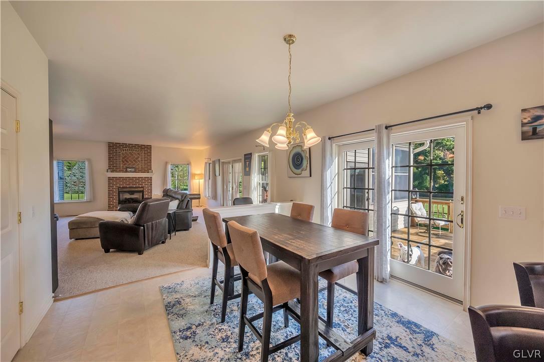2715 Maple Drive Hellertown, PA 18055 - Photo 19 of 47 a view of a dining room with furniture window and wooden floor