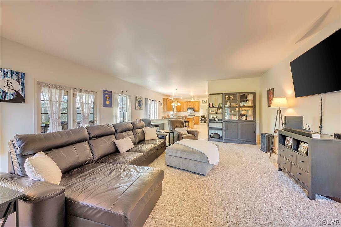 2715 Maple Drive Hellertown, PA 18055 - Photo 22 of 47 a living room with furniture and a flat screen tv