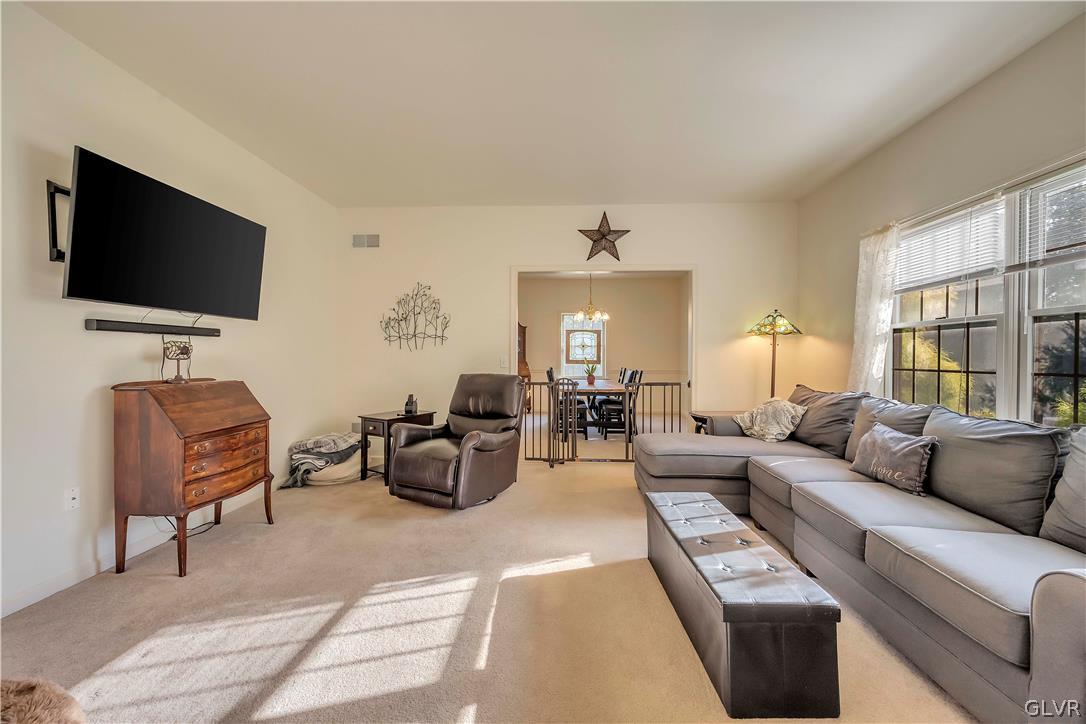 2715 Maple Drive Hellertown, PA 18055 - Photo 27 of 47 a living room with furniture and a flat screen tv