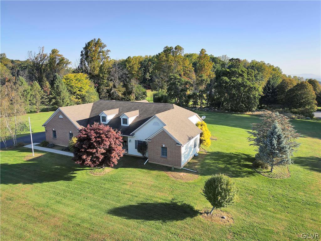 2715 Maple Drive Hellertown, PA 18055 - Photo 4 of 47 a view of a house with a big yard