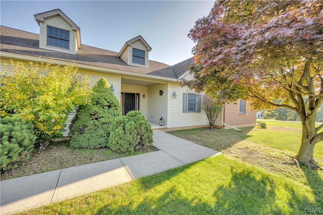 2715 Maple Drive Hellertown, PA 18055 - Photo 8 of 47 a front view of a house with garden