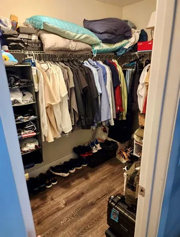 a bathroom with a toilet a sink and a mirror