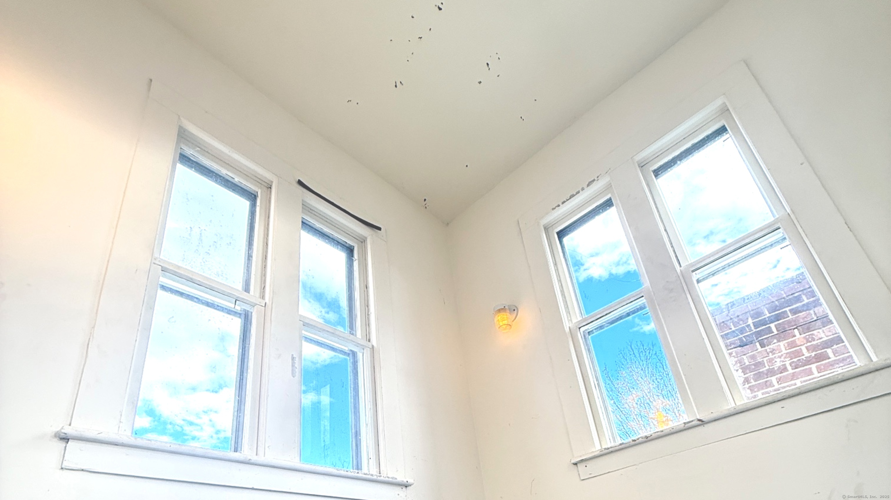 23 Hayward Avenue, Unit 5 Colchester, CT 06415 - Photo 17 of 20 a view of an entryway with wooden floor