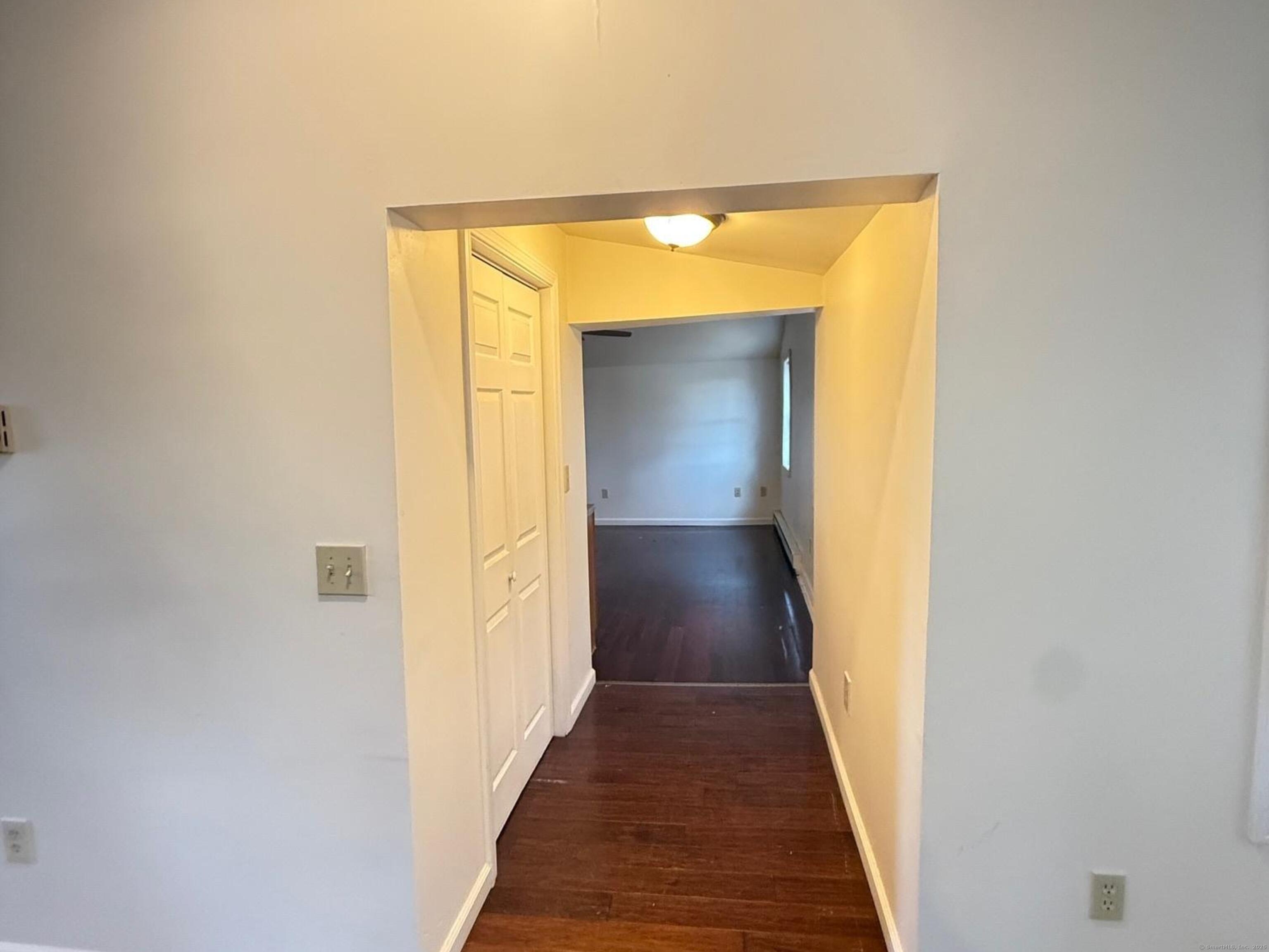 23 Hayward Avenue, Unit 5 Colchester, CT 06415 - Photo 6 of 20 a view of a hallway with wooden floor