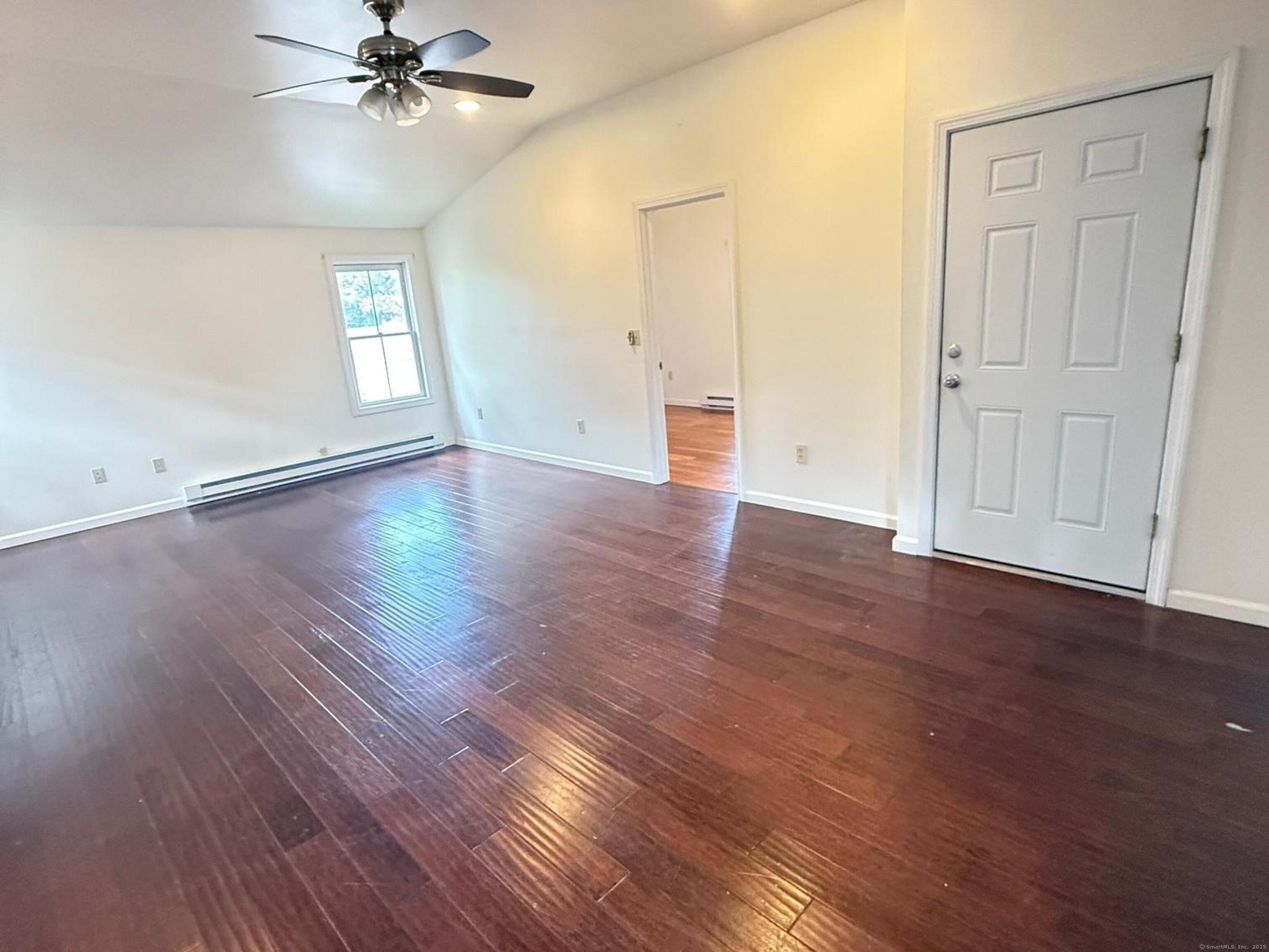 23 Hayward Avenue, Unit 5 Colchester, CT 06415 - Photo 8 of 20 a view of a livingroom with wooden floor and window