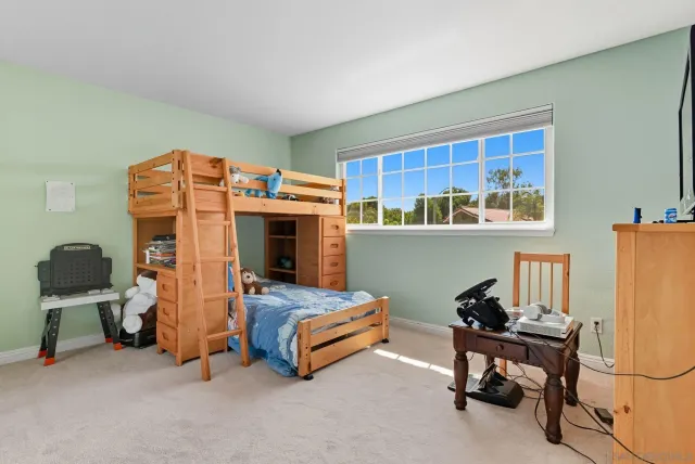 a bedroom with furniture and a couch