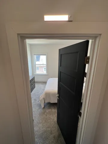 a bathroom with a sink and mirror