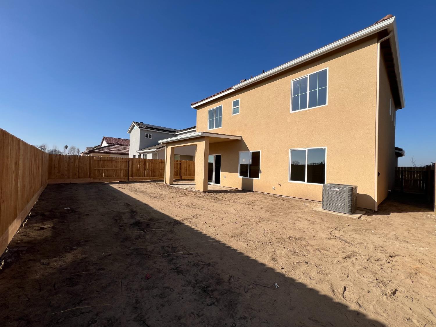 1420 Concord Way Dinuba, CA 93618 - Photo 14 of 16 a very nice looking house with a yard