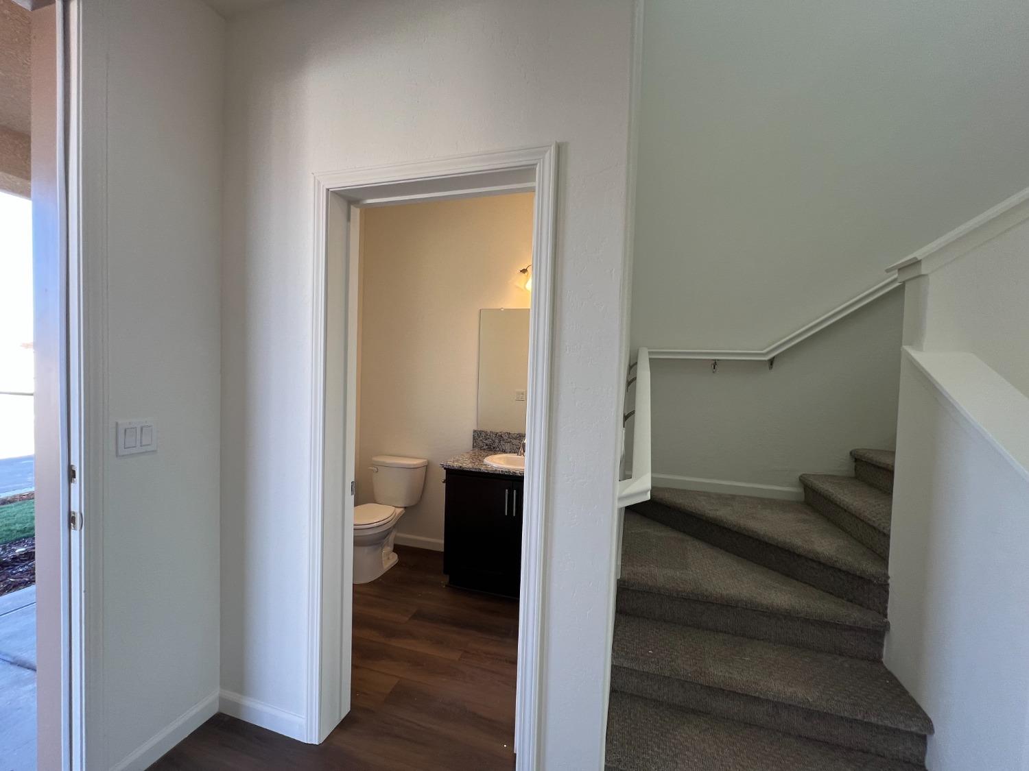 1420 Concord Way Dinuba, CA 93618 - Photo 4 of 16 a view of a bathroom with a toilet