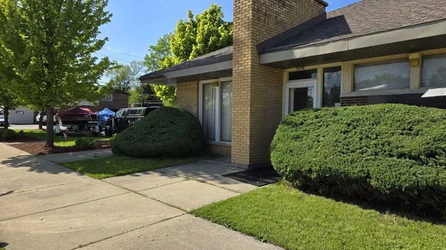 a view of a house with a garden