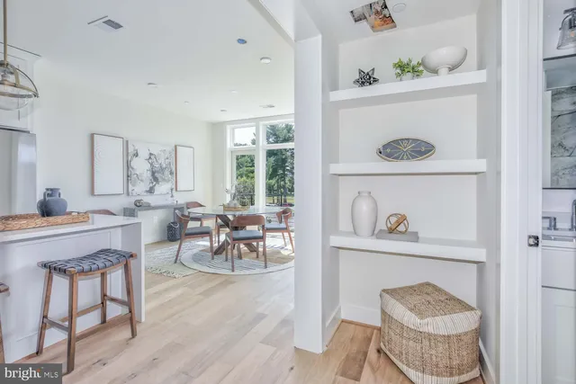 a bedroom with a bed and a chair