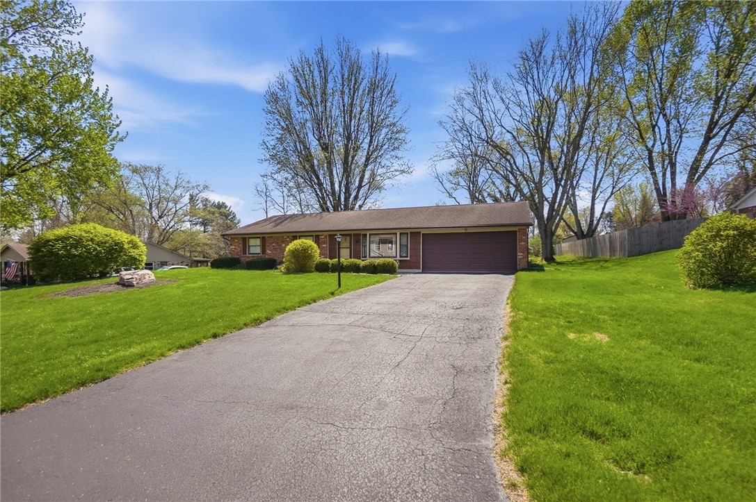 6225 Possum Run Road Bellbrook, OH 45305 - Photo 3 of 33 This charming residence offers a spacious yard and inviting curb appeal.