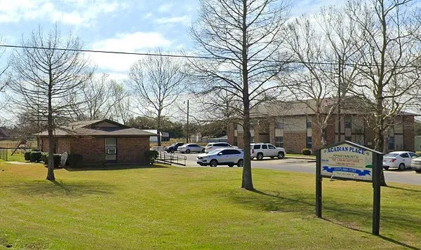 a view of swimming pool with chairs