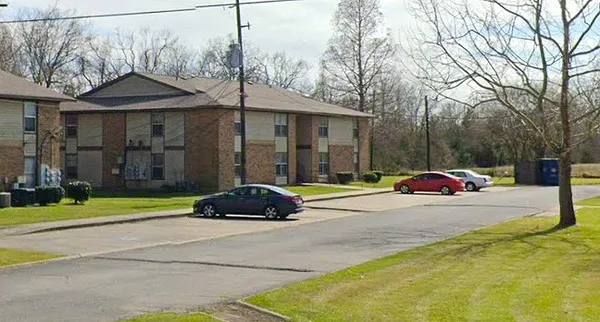 a car parked in front of a house