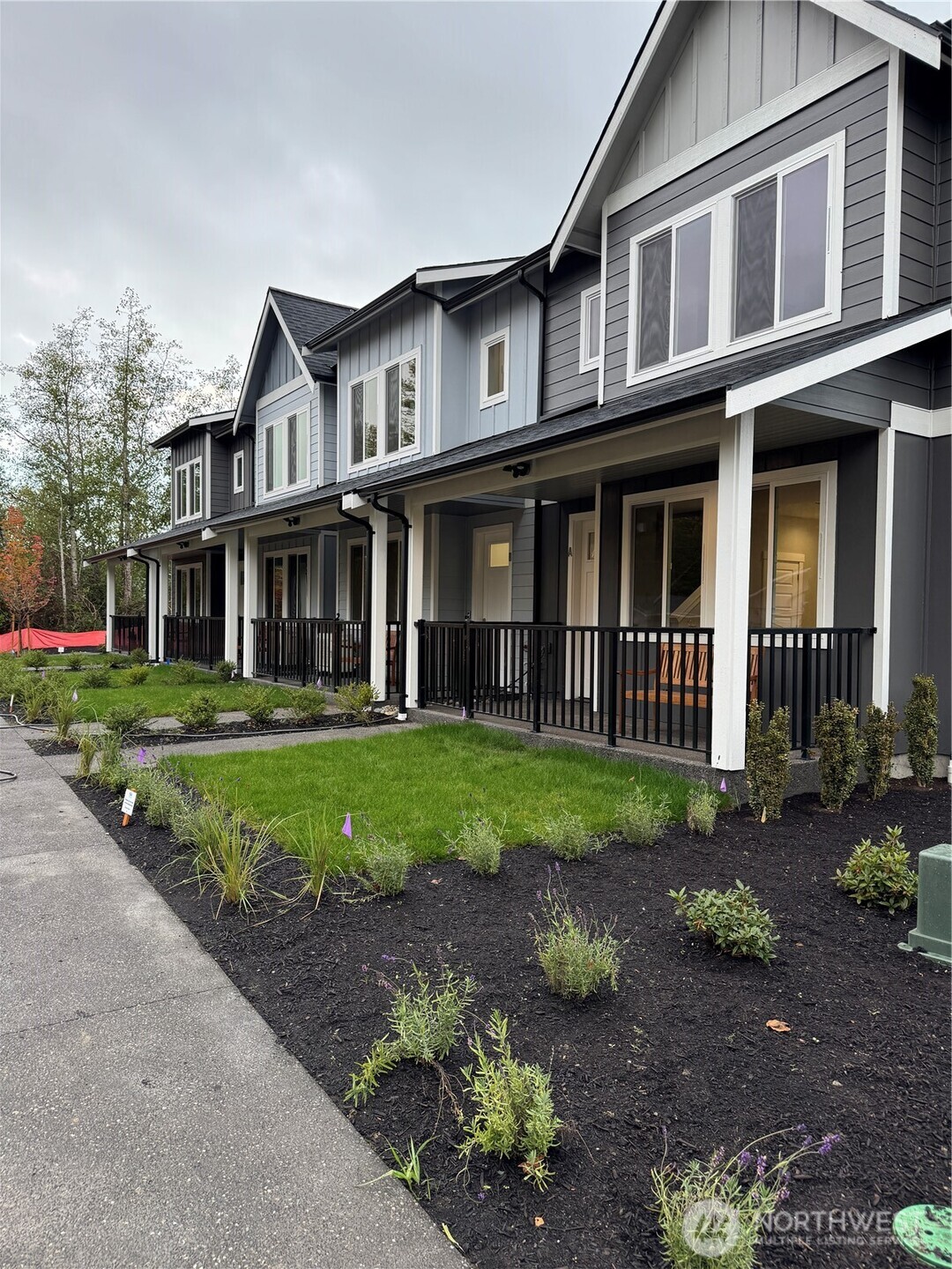 1515 North Waugh Road, Unit B Mount Vernon, WA 98273 - Photo 1 of 28 a view of a yard in front of a house