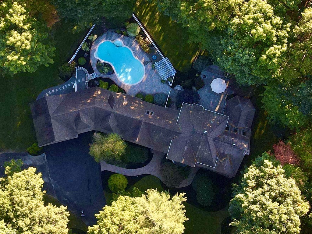 355 Maple Street West Boylston, MA 01583 - Photo 1 of 42 an aerial view of a house a yard and a garden