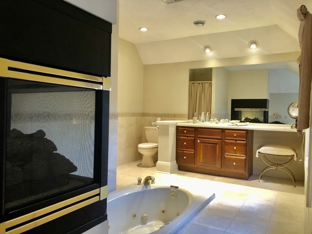 355 Maple Street West Boylston, MA 01583 - Photo 11 of 42 a spacious bathroom with a sink double vanity and a mirror