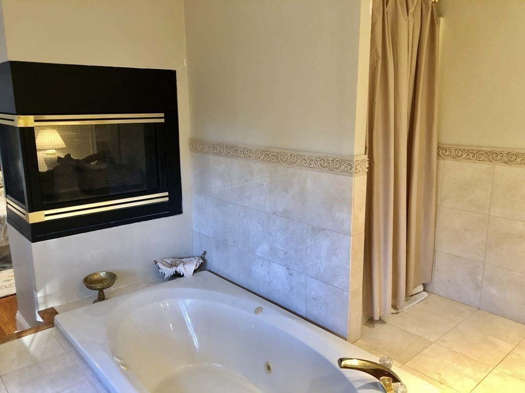355 Maple Street West Boylston, MA 01583 - Photo 12 of 42 a bathroom with a sink and a mirror