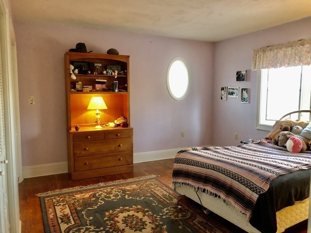 355 Maple Street West Boylston, MA 01583 - Photo 16 of 42 a bedroom with a bed and a television