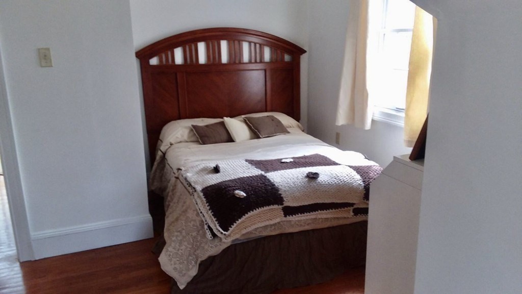 355 Maple Street West Boylston, MA 01583 - Photo 17 of 42 a bedroom with a bed and a window