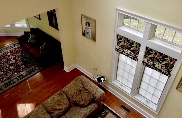 355 Maple Street West Boylston, MA 01583 - Photo 20 of 42 a bed sitting in a bedroom next to a window