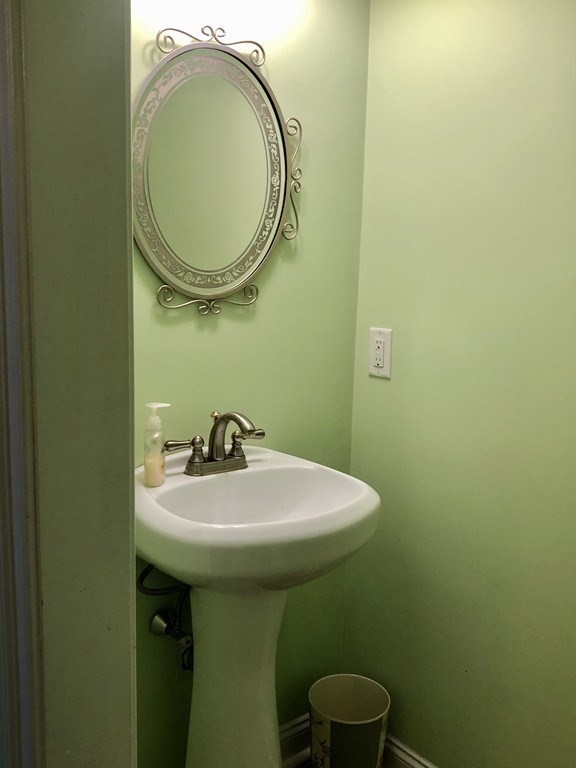 355 Maple Street West Boylston, MA 01583 - Photo 23 of 42 a bathroom with a sink and a mirror