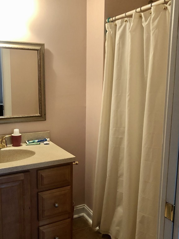 355 Maple Street West Boylston, MA 01583 - Photo 31 of 42 a bathroom with a sink and a mirror