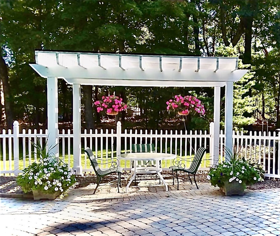 355 Maple Street West Boylston, MA 01583 - Photo 36 of 42 a front view of a house with a bench