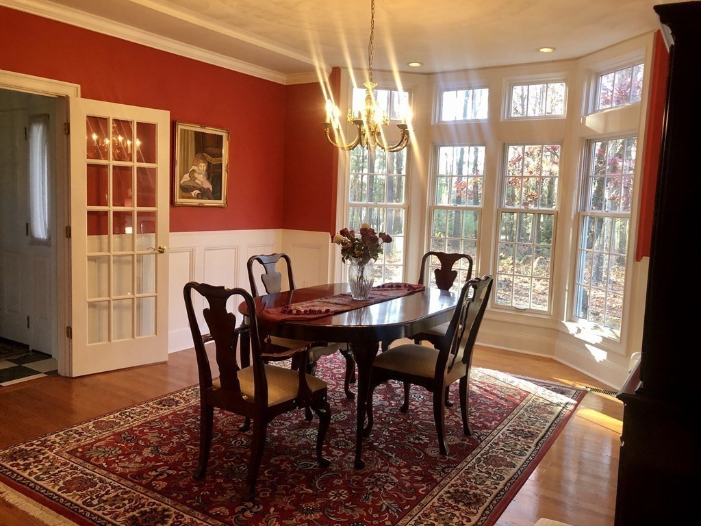 355 Maple Street West Boylston, MA 01583 - Photo 4 of 42 a view of a dining room with furniture window and wooden floor