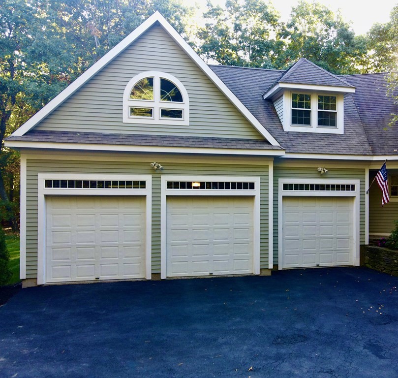 355 Maple Street West Boylston, MA 01583 - Photo 41 of 42 a front view of a house with a yard