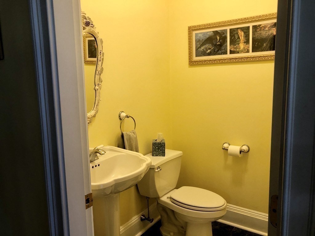 355 Maple Street West Boylston, MA 01583 - Photo 8 of 42 a bathroom with a sink and mirror