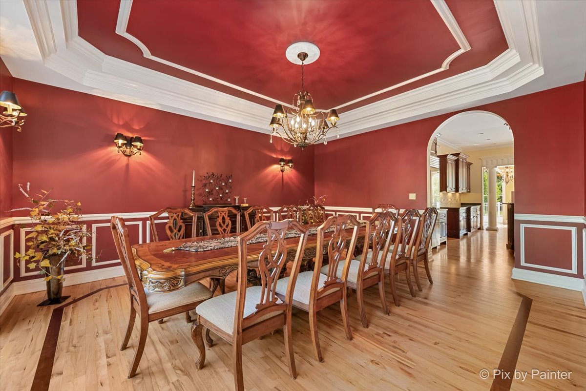 27 West Onwentsia Road Lake Forest, IL 60045 - Photo 16 of 84 a view of a dining room with furniture and wooden floor