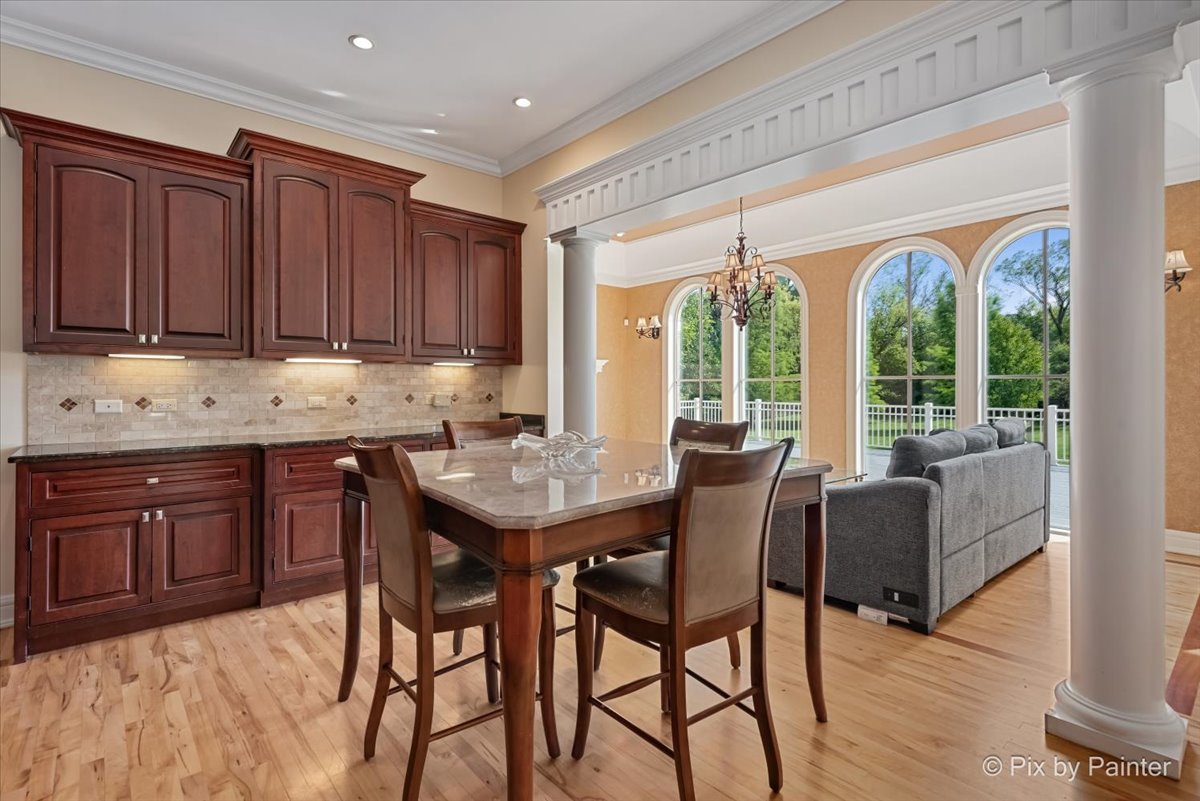 27 West Onwentsia Road Lake Forest, IL 60045 - Photo 29 of 84 a view of a dining room with furniture window and outside view