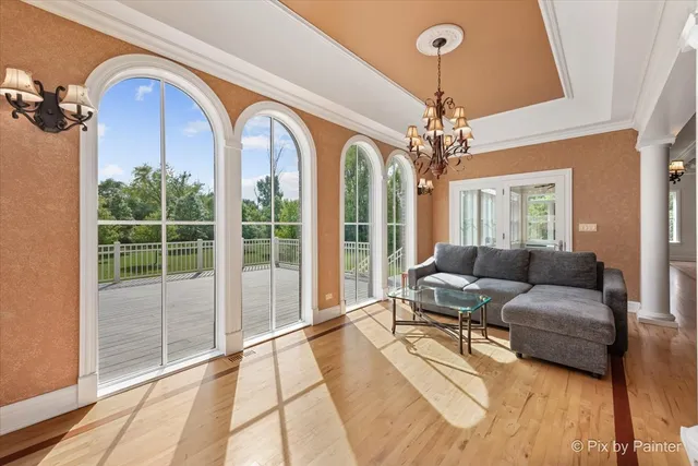 a spacious bathroom with a sink a large mirror and a bathtub