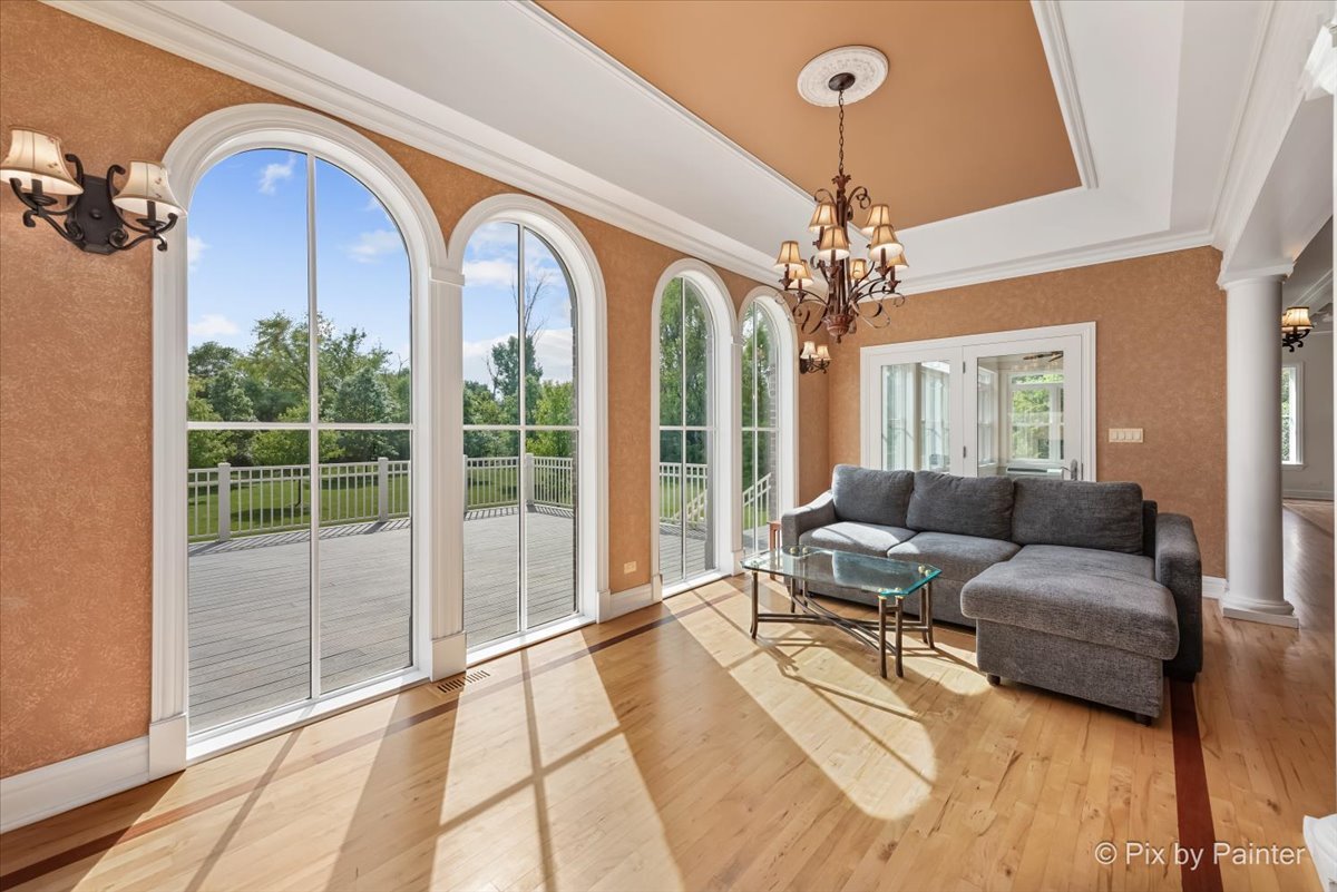 27 West Onwentsia Road Lake Forest, IL 60045 - Photo 32 of 84 a living room with furniture and a chandelier