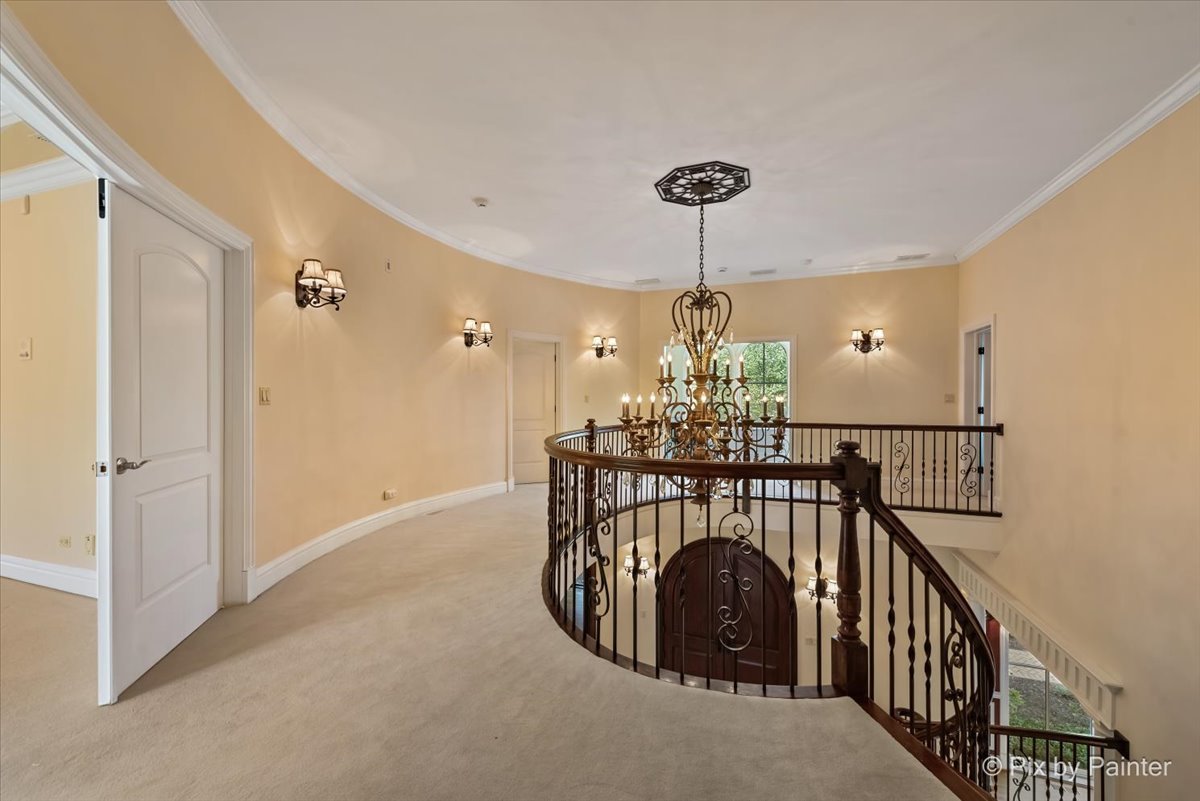 27 West Onwentsia Road Lake Forest, IL 60045 - Photo 37 of 84 a view of entryway dining room and hall with wooden floor
