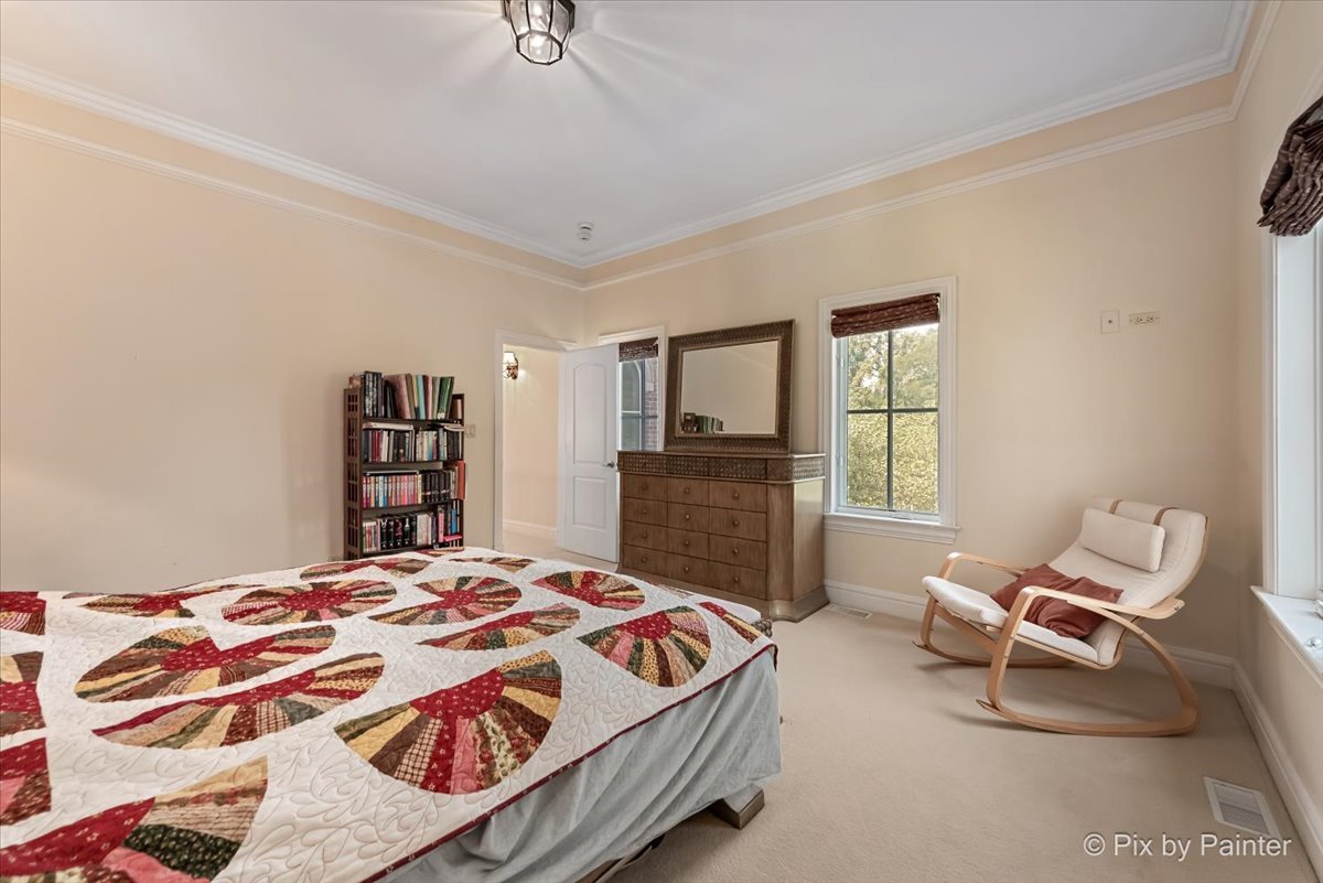 27 West Onwentsia Road Lake Forest, IL 60045 - Photo 41 of 84 a bedroom with a bed and a window