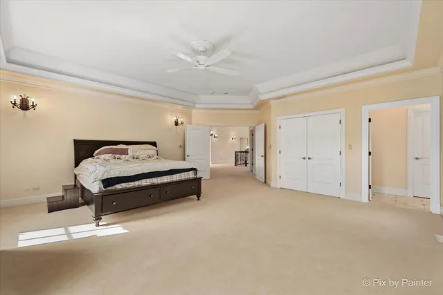 a front view of a house with a yard table and chairs