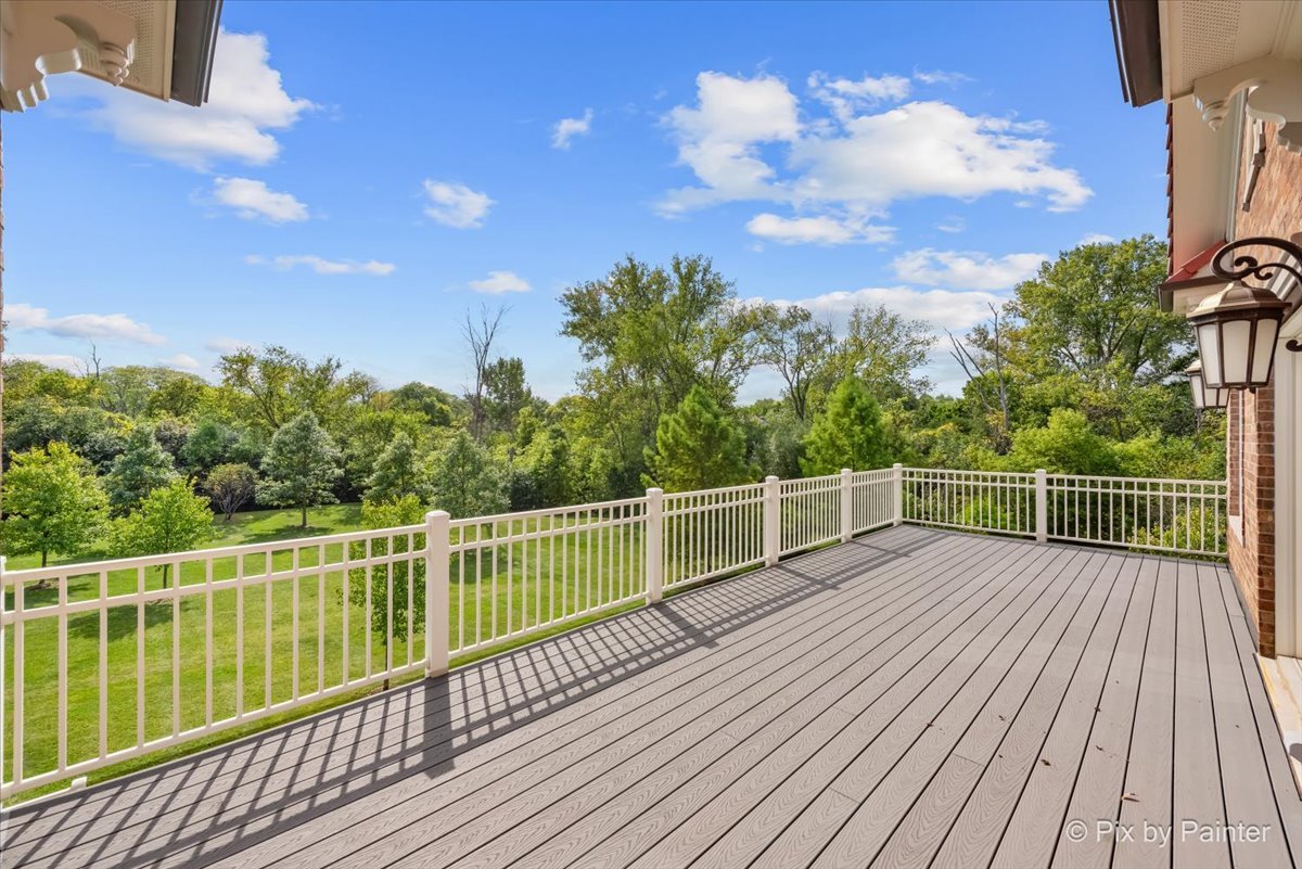 27 West Onwentsia Road Lake Forest, IL 60045 - Photo 59 of 84 a view of a balcony with wooden floor