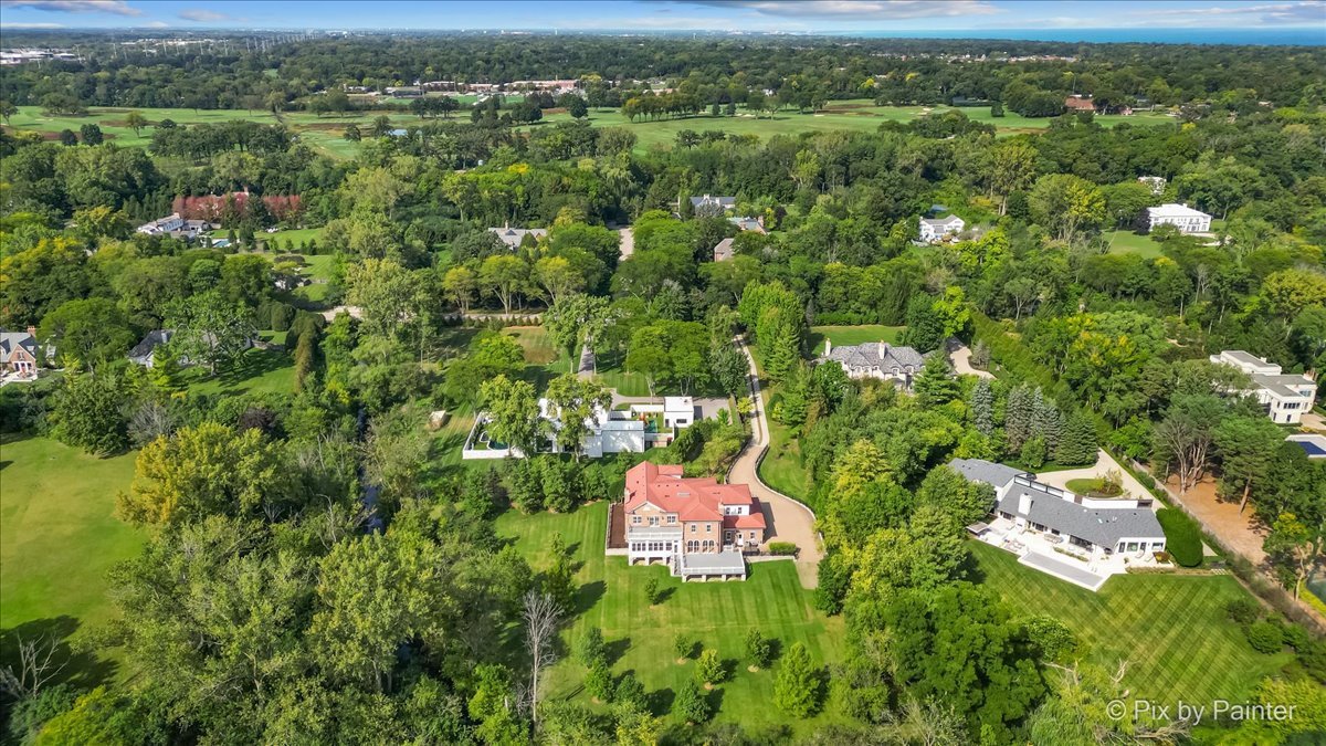 27 West Onwentsia Road Lake Forest, IL 60045 - Photo 64 of 84 an aerial view of residential houses with outdoor space and trees