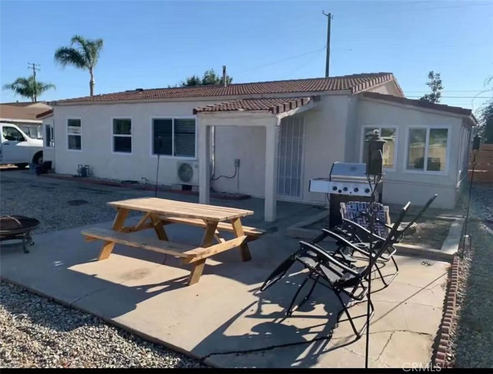 12964 Roswell Avenue Chino, CA 91710 - Photo 2 of 14 a front view of a house with patio